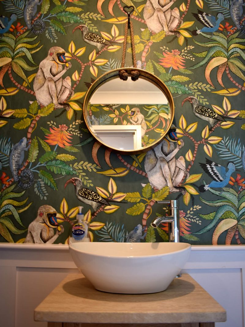 Cloakroom with mirror and a basin